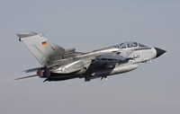 Framed German Air Force Tornado ECR taking off over Germany