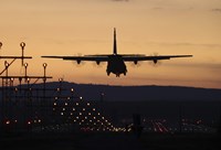 Framed C-130J Super Hercules Landing at Ramstein Air Base, Germany, at Dusk