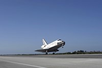 Framed Space shuttle Atlantis approaching Runway 33 at the Kennedy Space Center in Florida