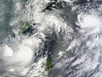 Framed Three Strong Storms Churn in the Pacific Ocean Basin off the Asian coast