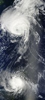 Framed Two Powerful Storms Span the Atlantic Ocean