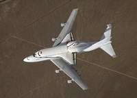 Framed overhead view of Atlantis Atop a Modified 747 Aircraft