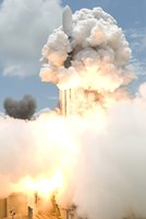 Framed Smoke Envelops the Delta II Rocket