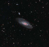 Framed Messier 106, a spiral galaxy in the Constellation Canes Venatici