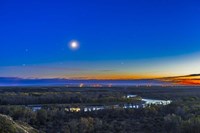Framed Moon with Antares, Mars and Saturn over Bow River in Alberta, Canada