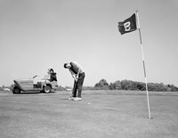 Framed 1960s Man Playing Golf Putting