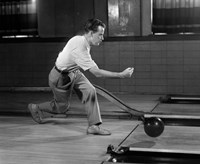 Framed 1950s Side View Of Man Bowling