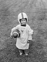 Framed 1950s Boy Standing In Grass