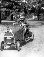Framed 1930s Boy Driving Home In Race Car