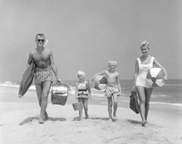 Framed 1950s Family Of Four Walking Towards Camera