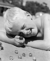 Framed 1950s Boy Crouching Shooting Marbles