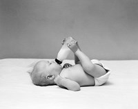 Framed 1940s Baby Prone Drinking From Milk Bottle