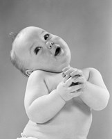 Framed 1950s Baby In Diaper Head To One Side Arms Hands Clasped In Front