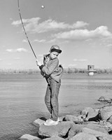 Framed 1980s Boy Fishing On Riverbank