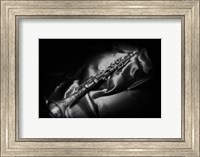 Framed Black And White Still-Life Image Of A Brass Clarinet