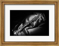 Framed Black And White Still-Life Image Of A Brass Clarinet