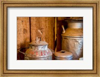 Framed Old Milk Containers From A Dairy Farm