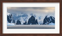 Framed Antarctic Peninsula, Antarctica, Spert Island Craggy Rocks And Mountains