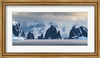 Framed Antarctic Peninsula, Antarctica, Spert Island Craggy Rocks And Mountains