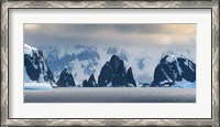 Framed Antarctic Peninsula, Antarctica, Spert Island Craggy Rocks And Mountains