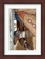 Framed Cowgirl Standing In Doorway Of Old Log Cabin