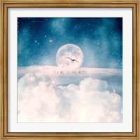 Framed Moonrise Over the Clouds