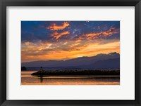 Framed Inukshuk In Setting Sun