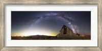 Framed Milky Way panorama over old barn