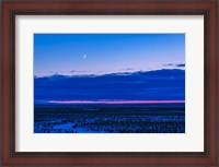 Framed Low Waxing Crescent Moon in the Evening Sky