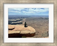Framed Adult Male Sitting on the Edge Of a Stunning Viewpoint