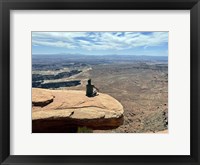 Framed Adult Male Sitting on the Edge Of a Stunning Viewpoint