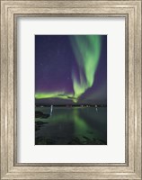 Framed Curtain of Aurora Sweeps Over the Houseboats Moored On Yellowknife Bay