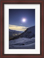 Framed Moon Above the Snow-Covered Alborz Mountain Range in Iran