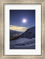 Framed Moon Above the Snow-Covered Alborz Mountain Range in Iran