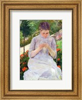 Framed Young Woman Sewing in the garden