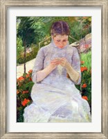 Framed Young Woman Sewing in the garden