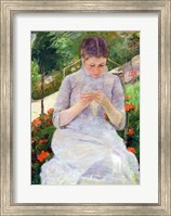 Framed Young Woman Sewing in the garden