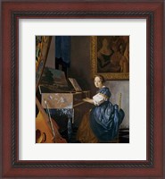 Framed Young Lady Seated at a Virginal