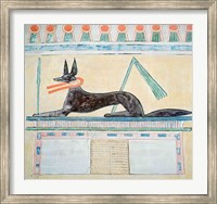 Framed Anubis, Egyptian god of the dead, lying on top of a sarcophagus