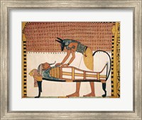 Framed Anubis attends Sennedjem's Mummy