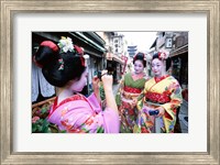 Framed Three geishas, Kyoto, Honshu, Japan (taking pictures)