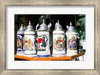 Framed Group of beer steins on a table, Munich, Germany