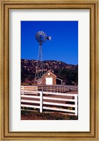 Framed USA, California, windmill on farm