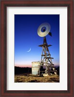 Framed Industrial windmill at night, California, USA