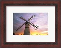 Framed Boats moored near a traditional windmill, Horsey Windpump, Horsey, Norfolk Broads, Norfolk, England