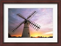 Framed Boats moored near a traditional windmill, Horsey Windpump, Horsey, Norfolk Broads, Norfolk, England