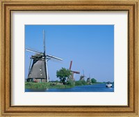 Framed Windmills and Canal Tour Boat, Kinderdijk, Netherlands