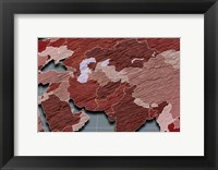 Framed Close-up of a world map - red and blue