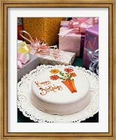 Framed High angle view of a birthday cake with gifts