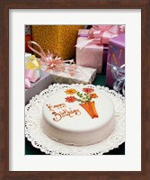 Framed High angle view of a birthday cake with gifts